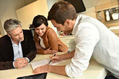 couple-choosing-kitchen-furniture-getting-260nw-394954009